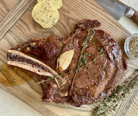 Pan-Seared Ribeye Steaks with Garlic Pepper Compound Butter