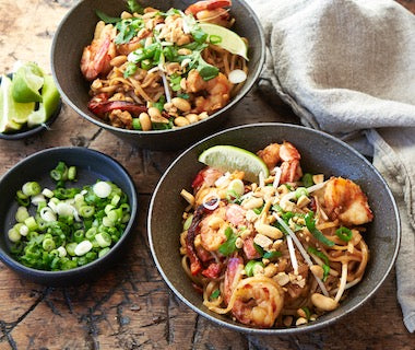 Close-up view of shrimp pad Thai in a bowl