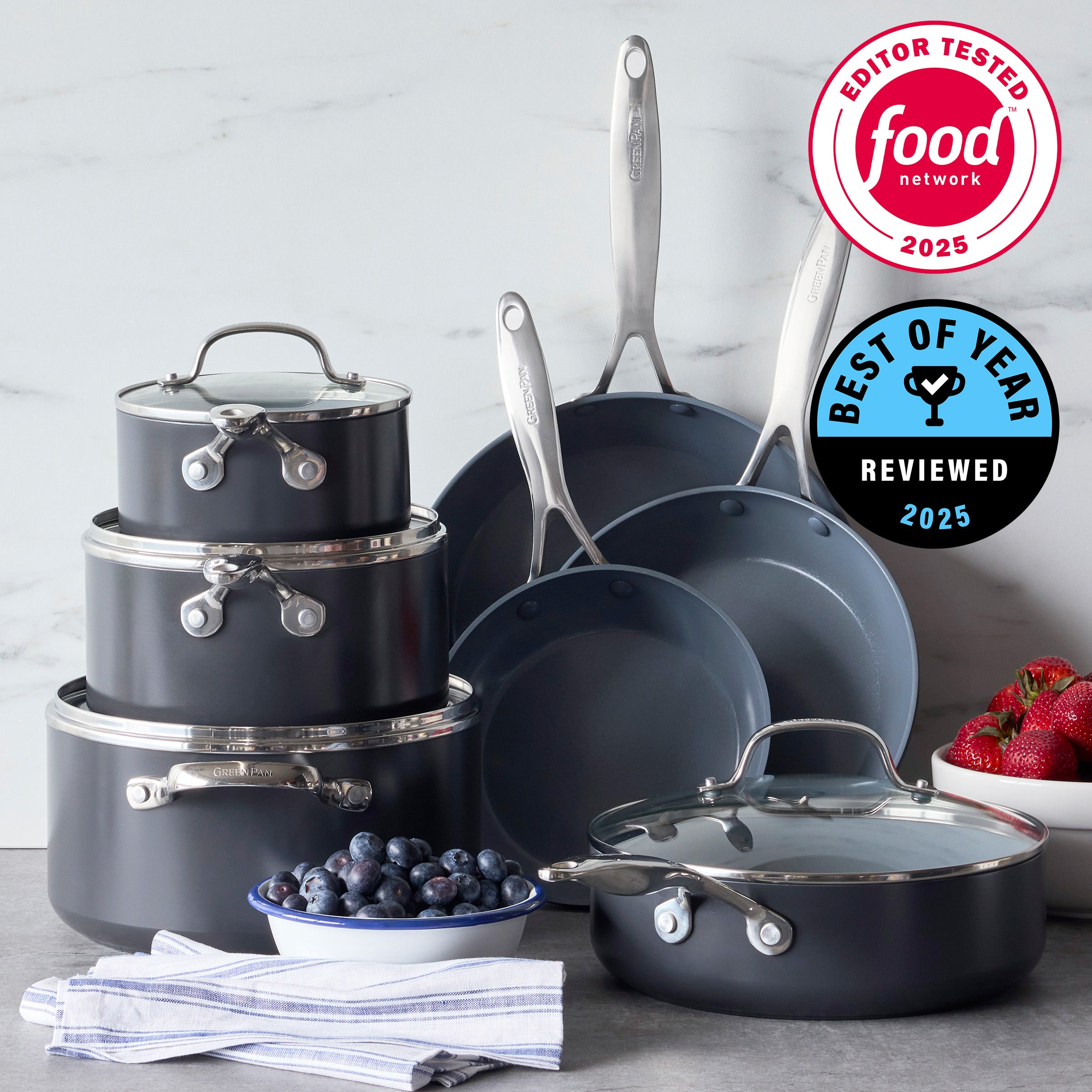 Set of Valencia Pro Ceramic Nonstick 11-Piece Set including pots, pans, and lids on a kitchen counter with Food Network logos and 'best of year' 2025 badge.