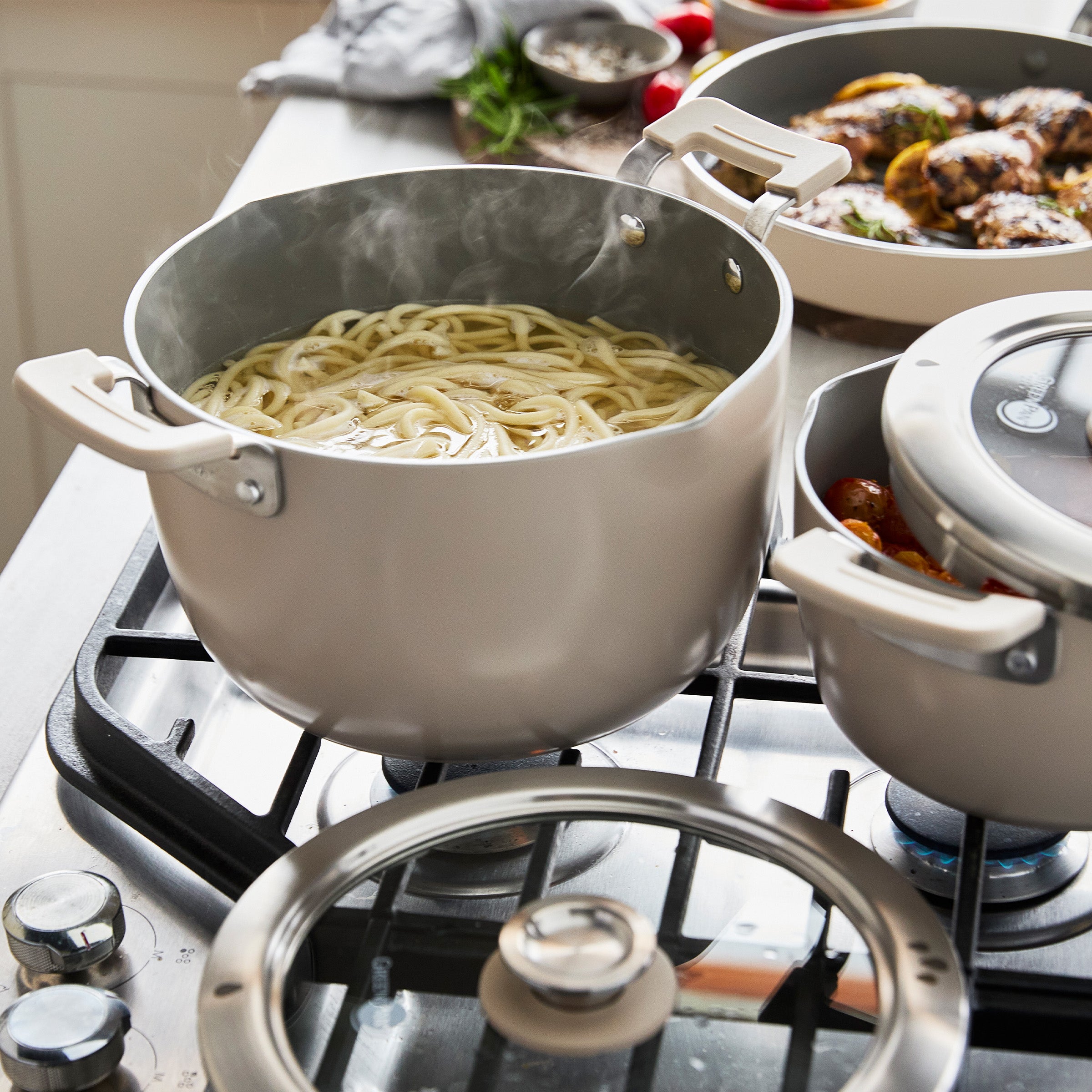 Taupe cookware on a stovetop