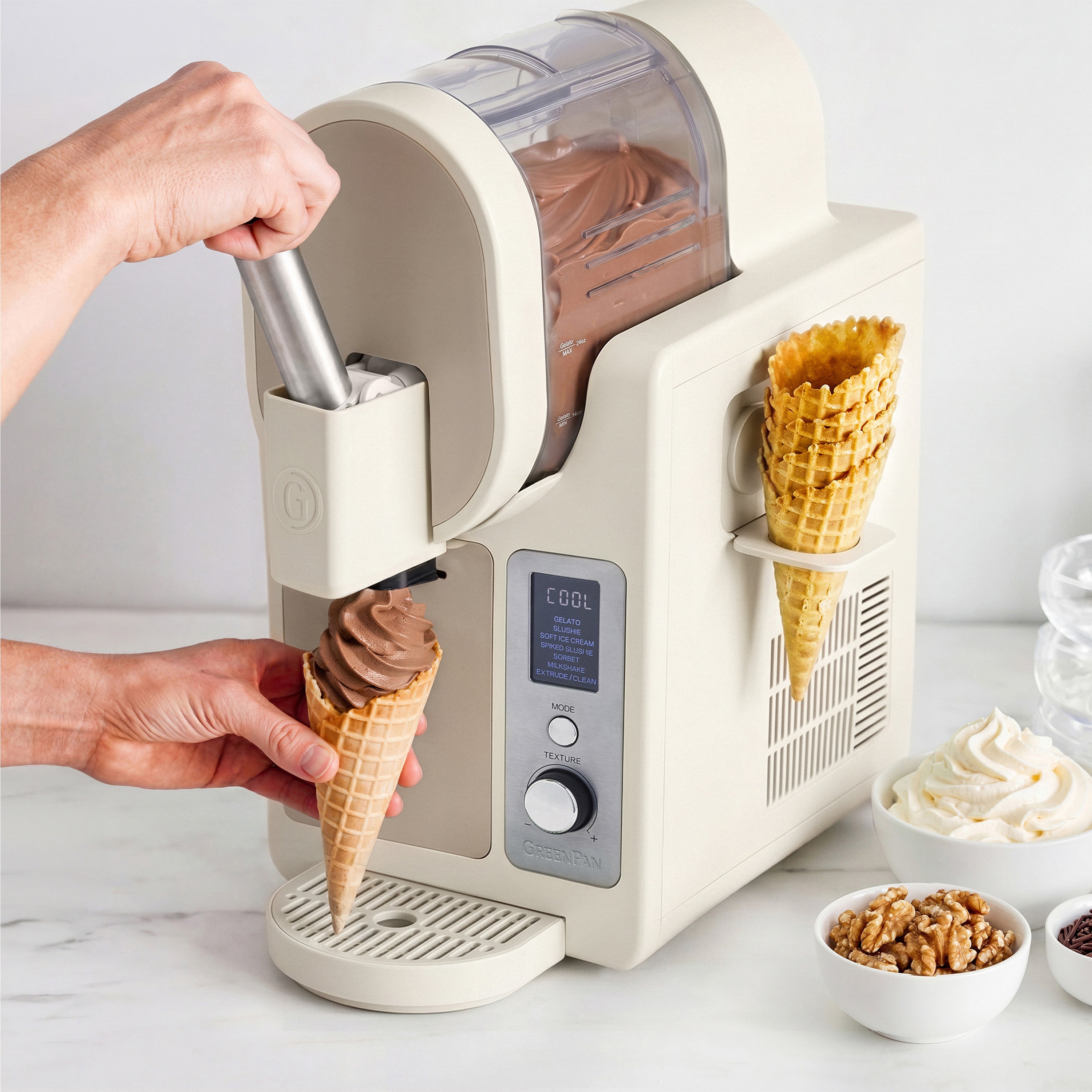 Ice cream maker dispensing chocolate ice cream into a cone