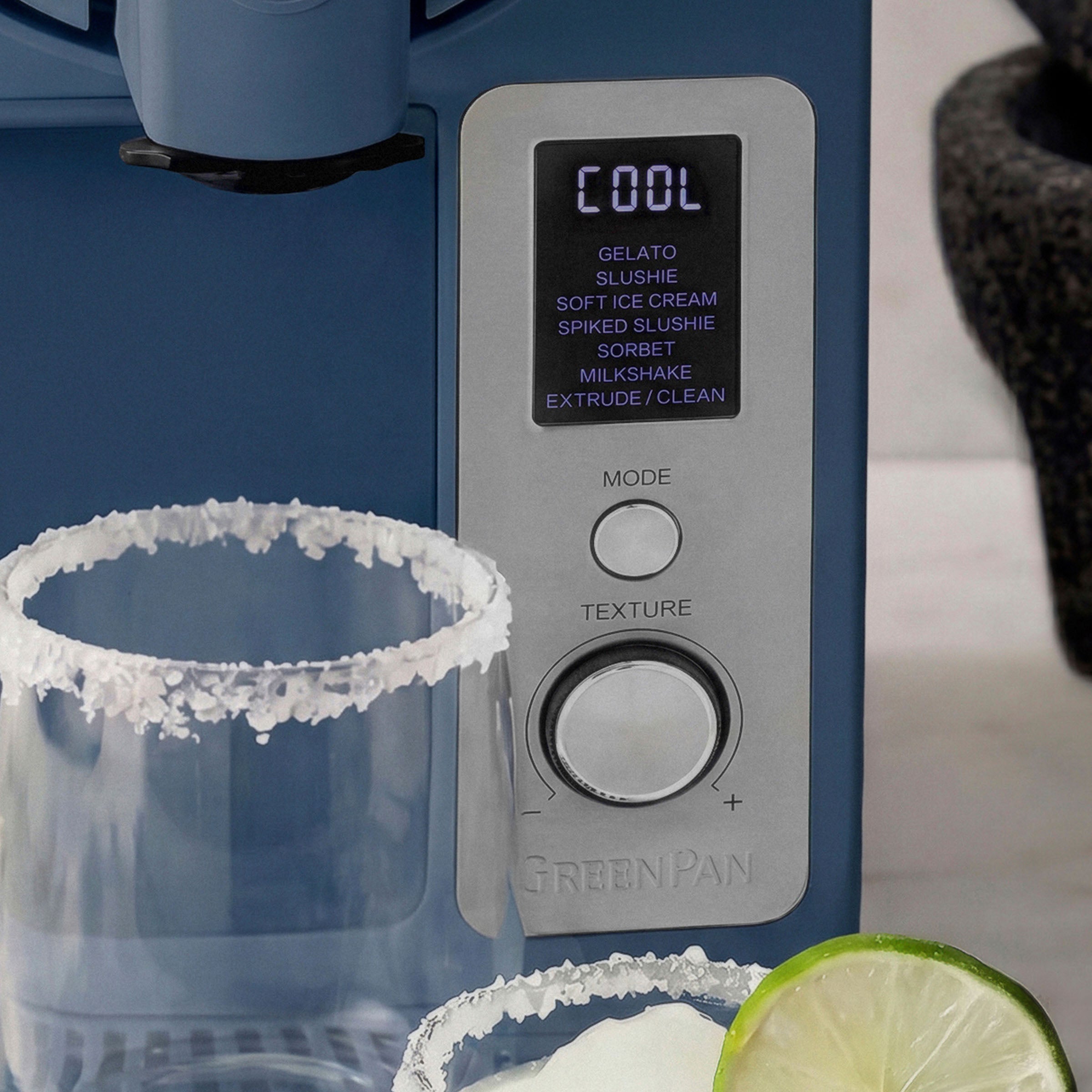 GreenPan ice cream maker with margarita glasses and lime slices on a kitchen counter