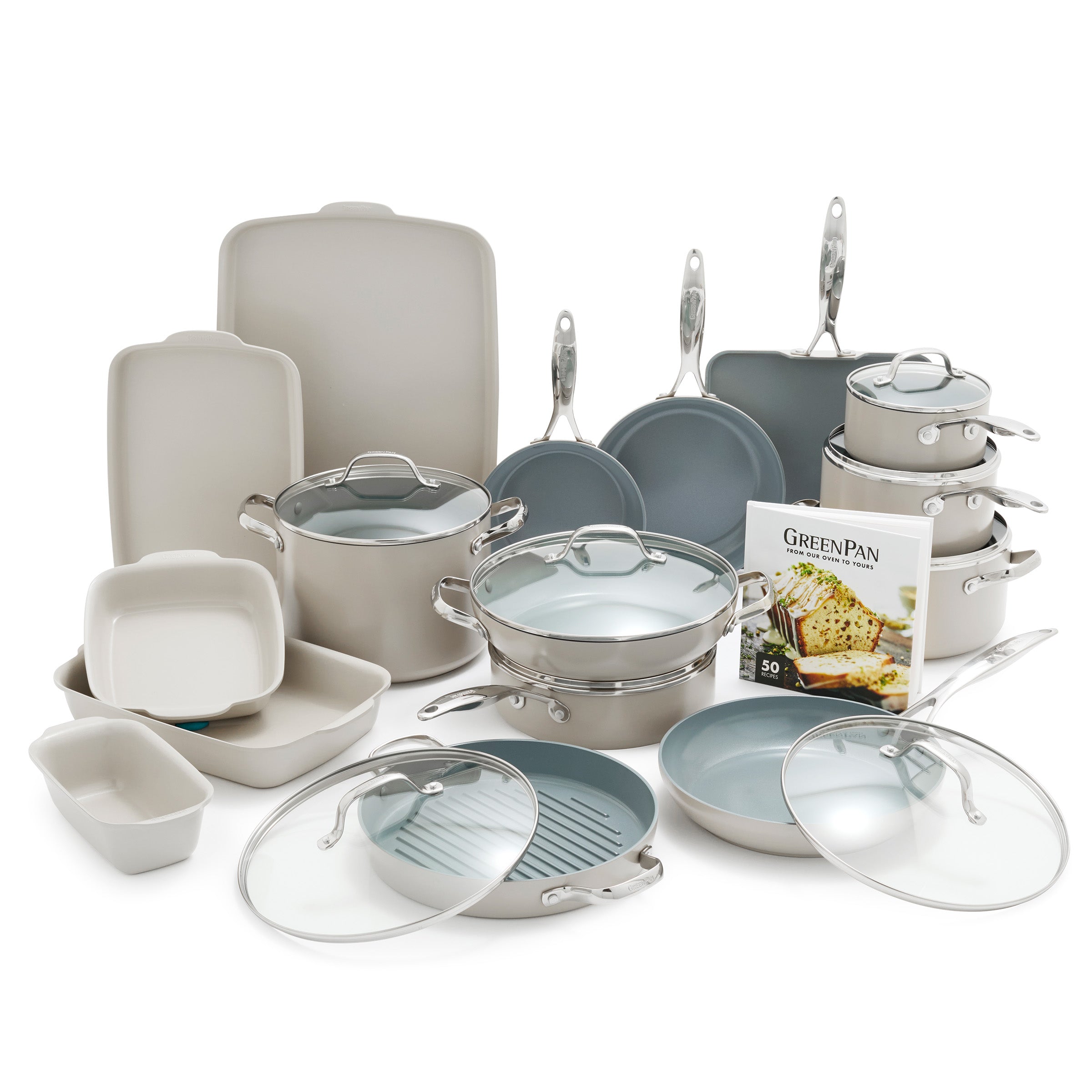 24-piece taupe ovenware set with pots, pans, lids, bakeware, and recipe booklet arranged on a white surface.