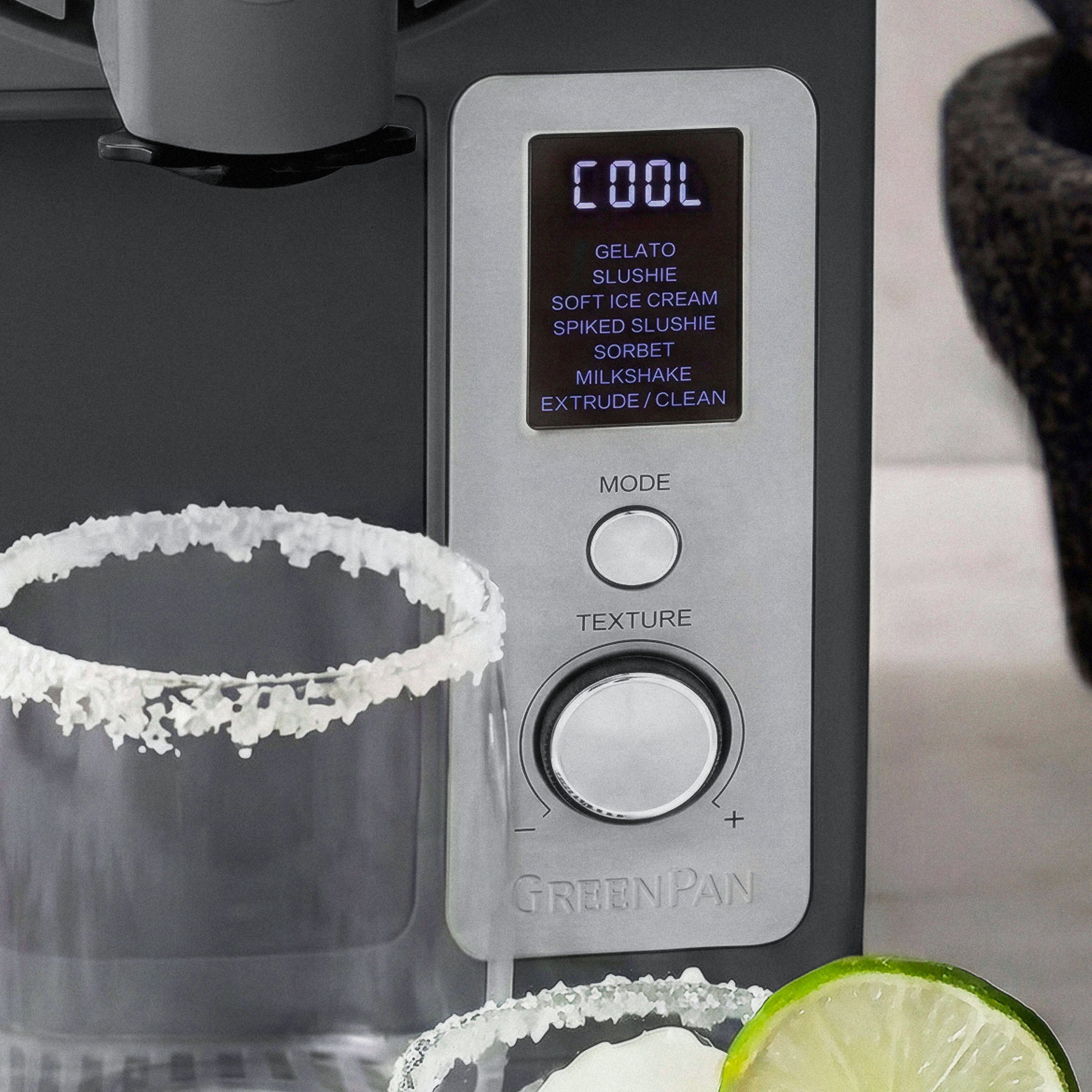 GreenPan ice cream maker with margarita glasses and lime slices on a kitchen counter
