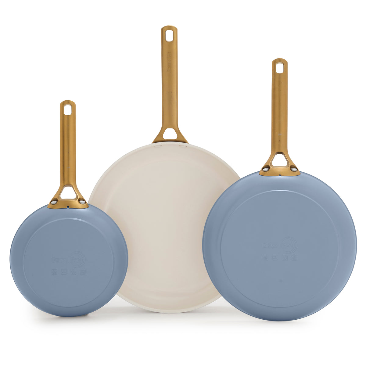 Three blue frying pans with gold handles on a white background