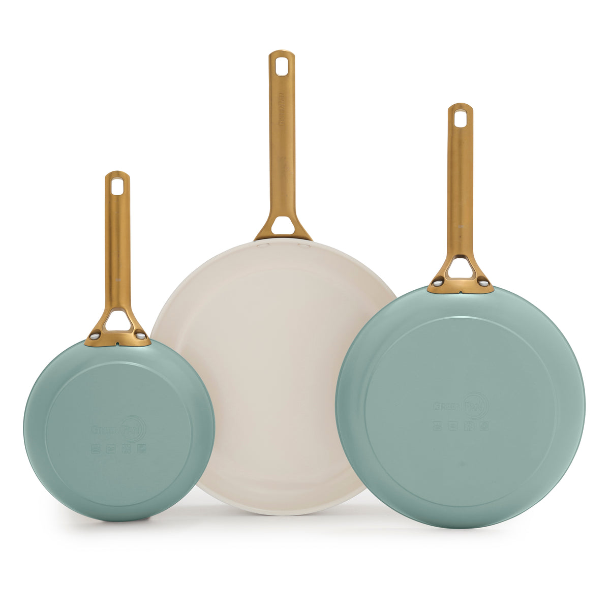 Three green frying pans with gold handles on a white background
