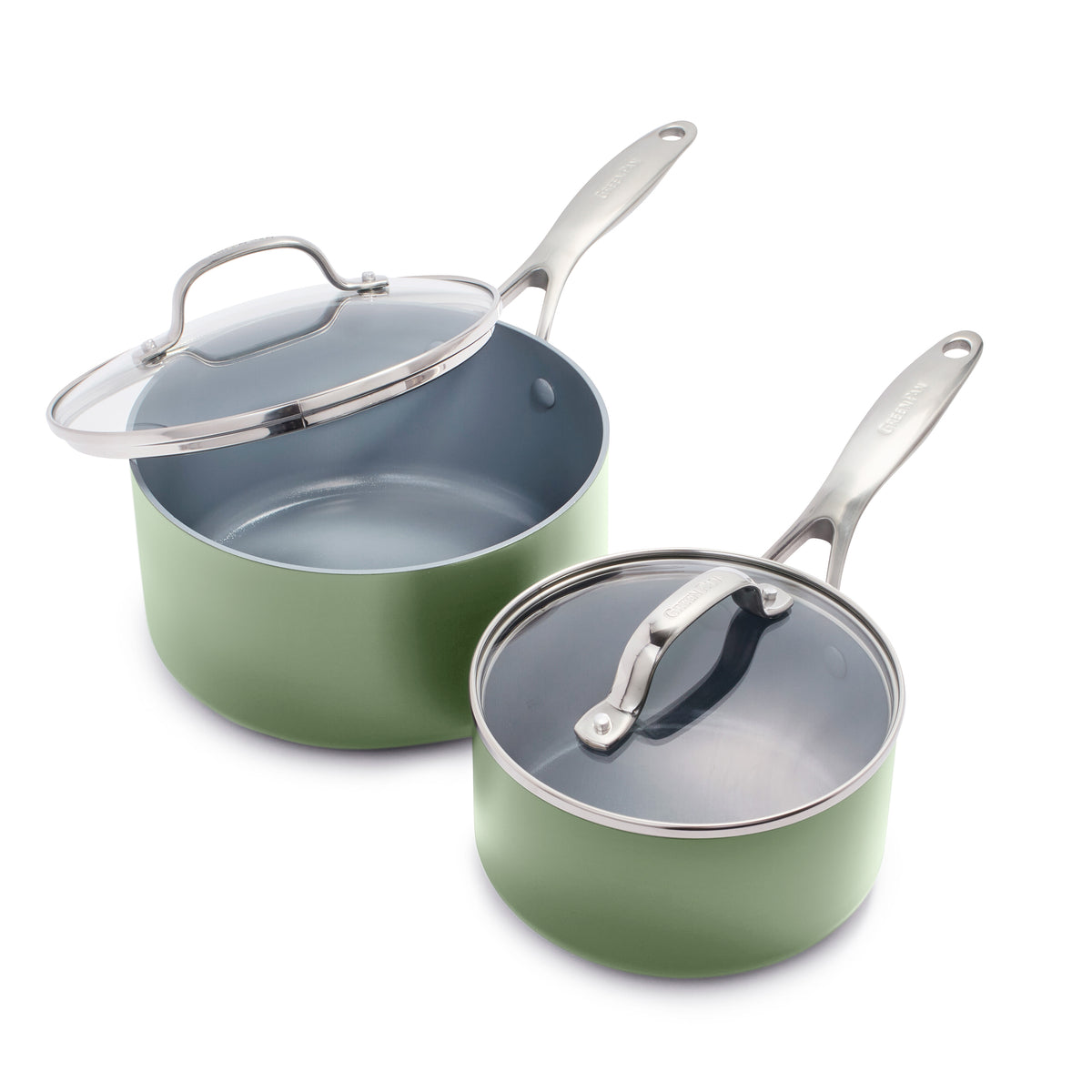 Two light sage green ceramic saucepans with stainless steel handles and clear glass lids, shown as a set.
