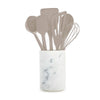 Taupe silicone utensil set with seven pieces, including a whisk, spatulas, ladles, and a matching crock holder.