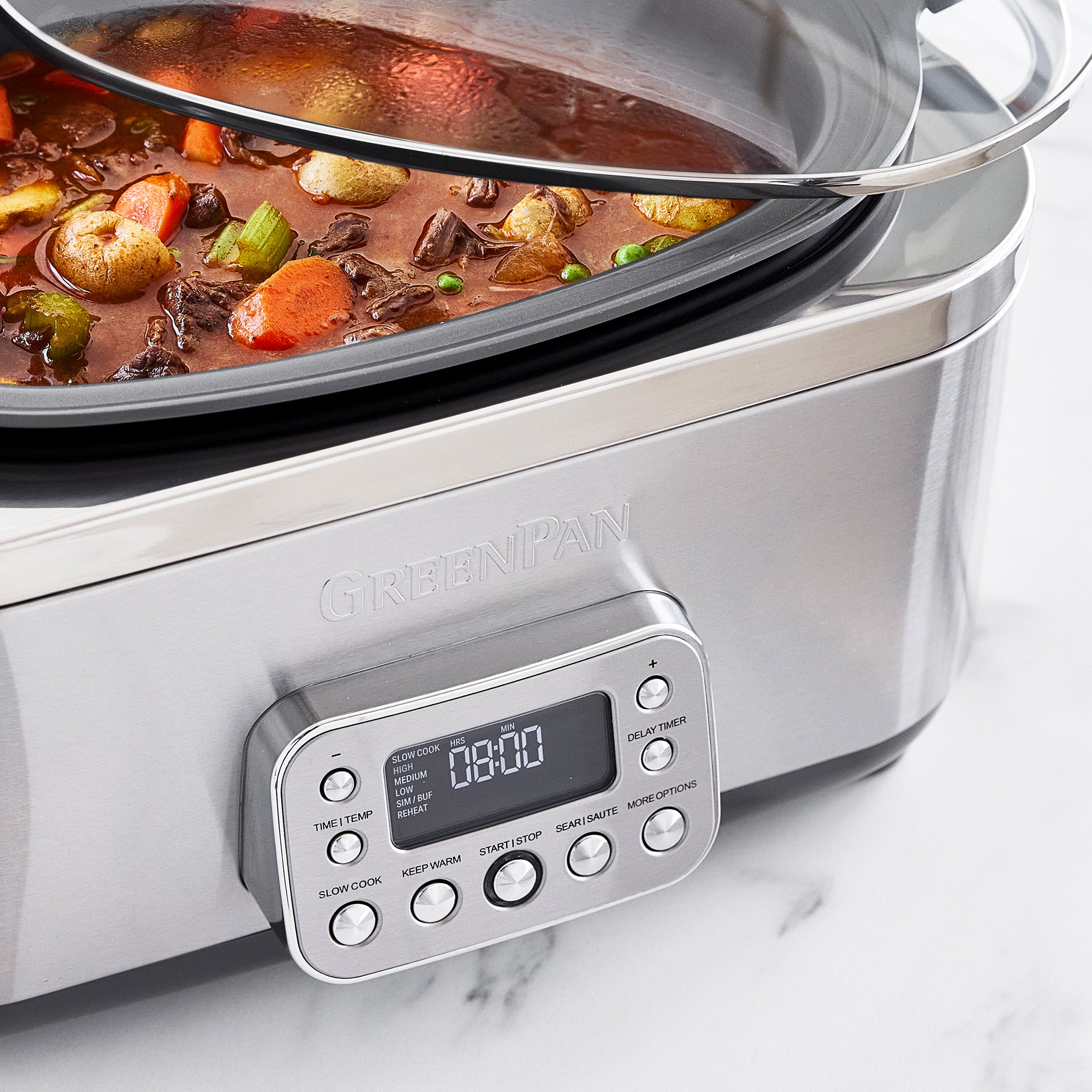 Slow cooker with a digital display on a white background