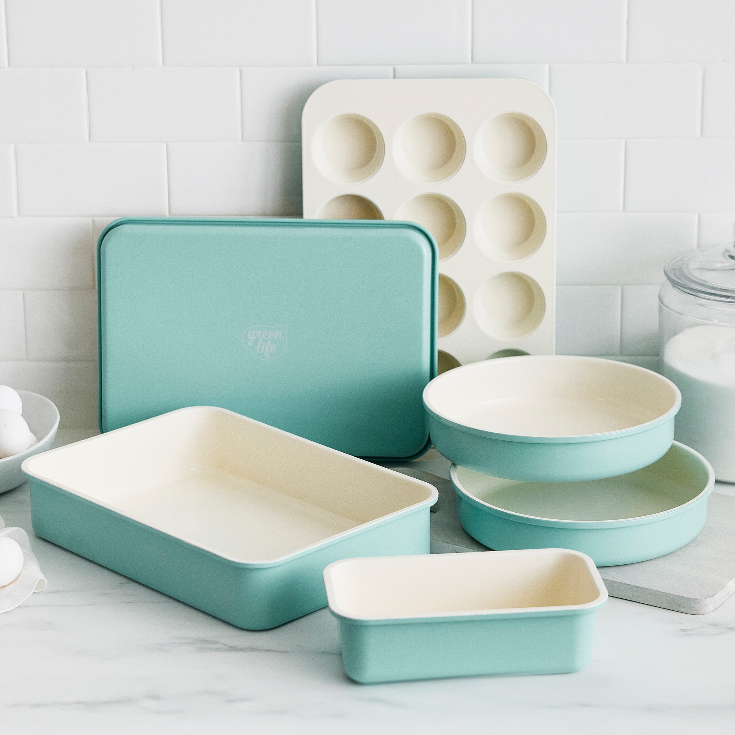 Set of turquoise bakeware on a kitchen counter