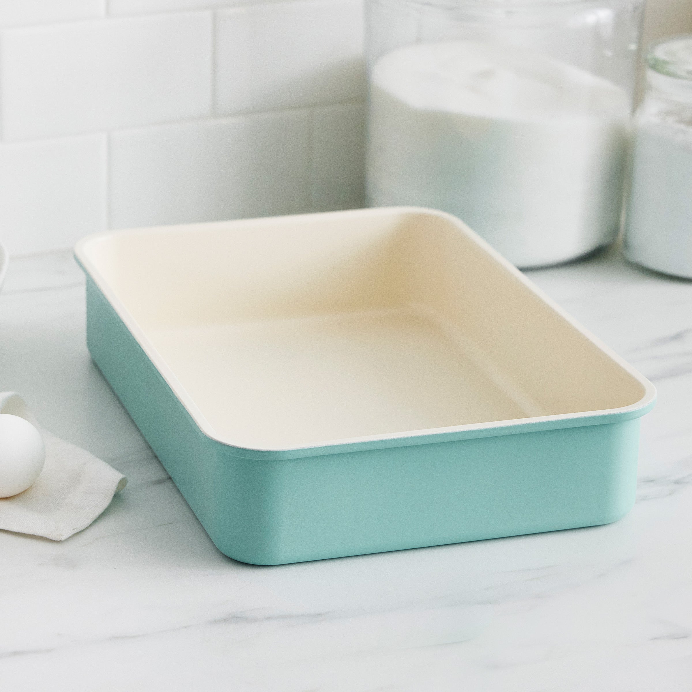 Turquoise cake pan on a kitchen counter