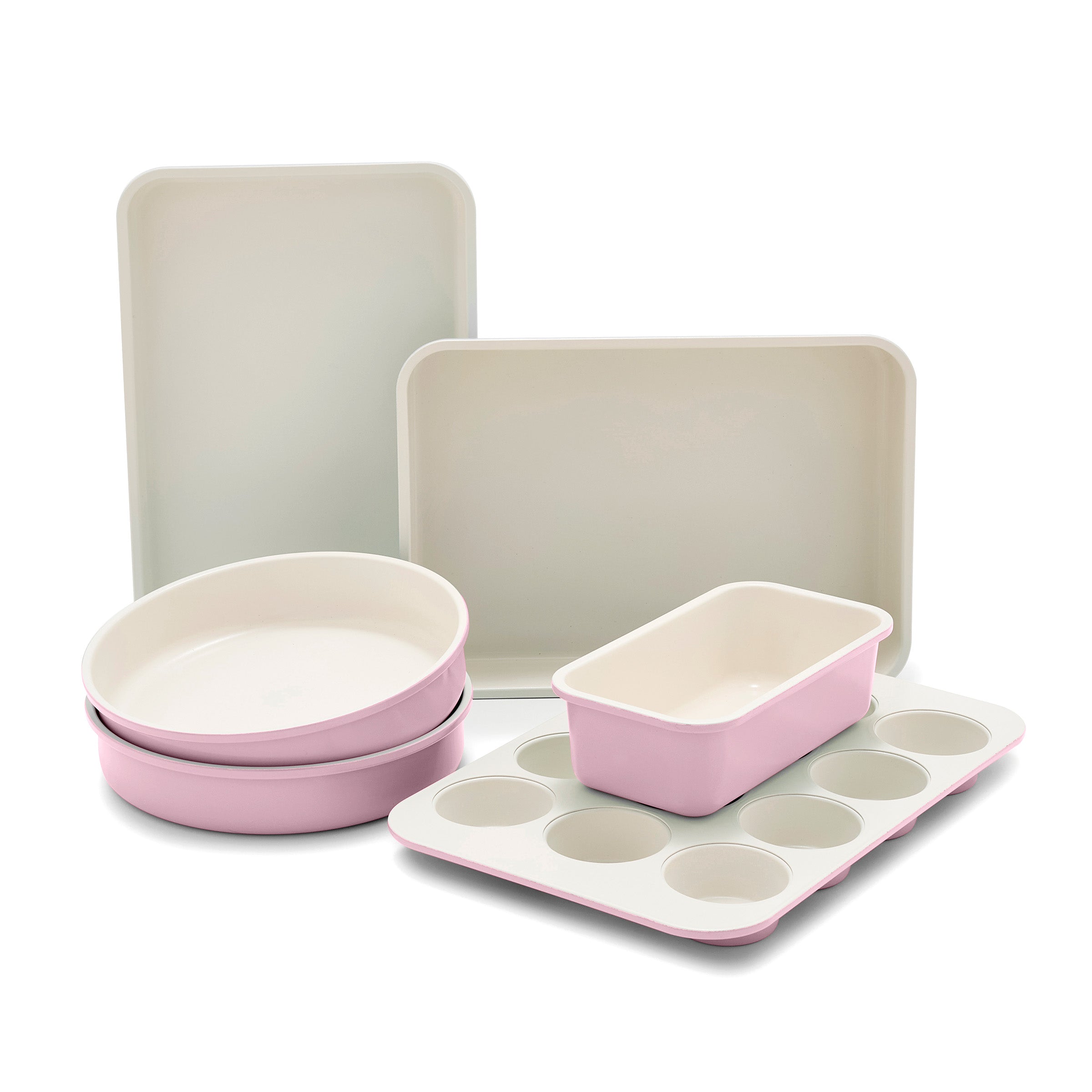 Set of pink bakeware on a white background