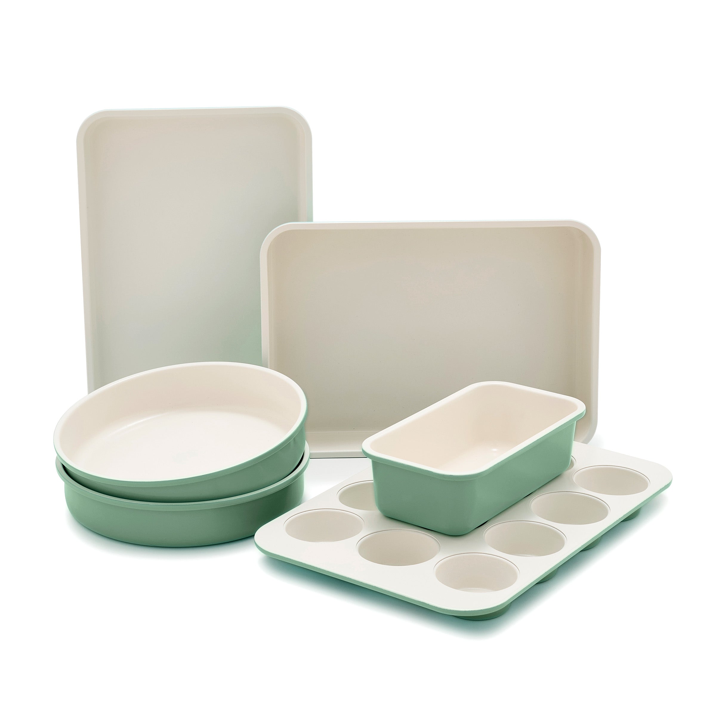 Set of green bakeware on a white background