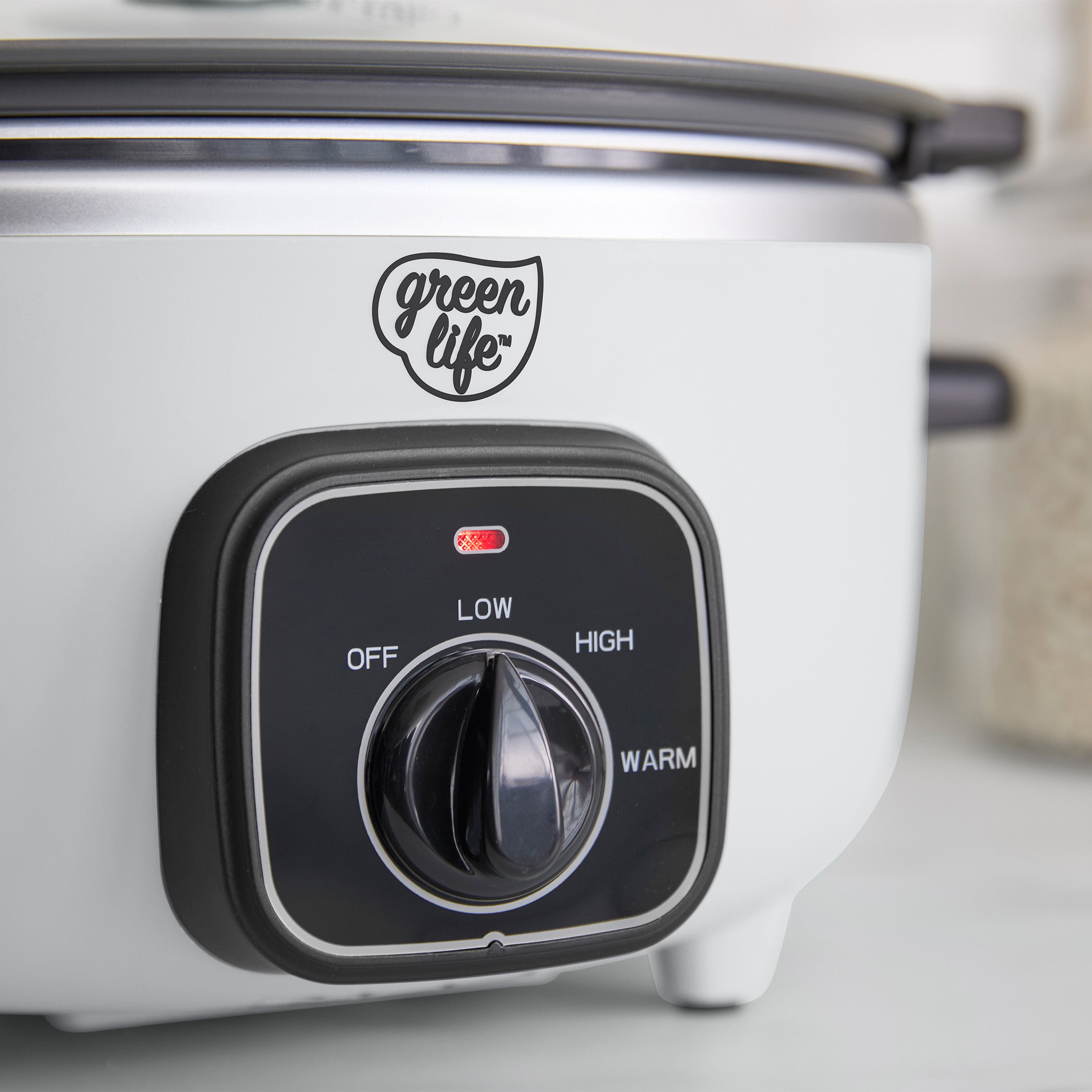White slow cooker with black control panel