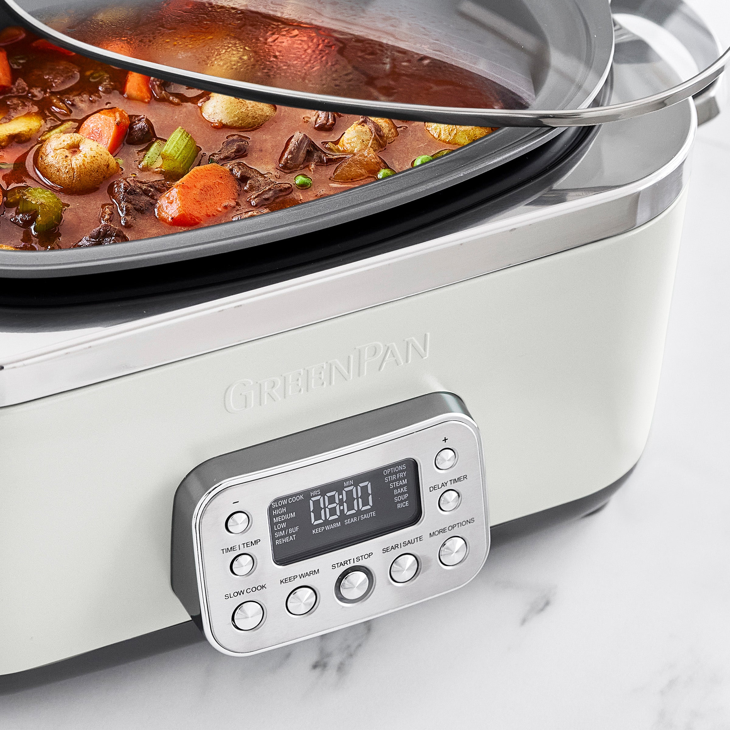 Slow cooker with a digital display on a white background