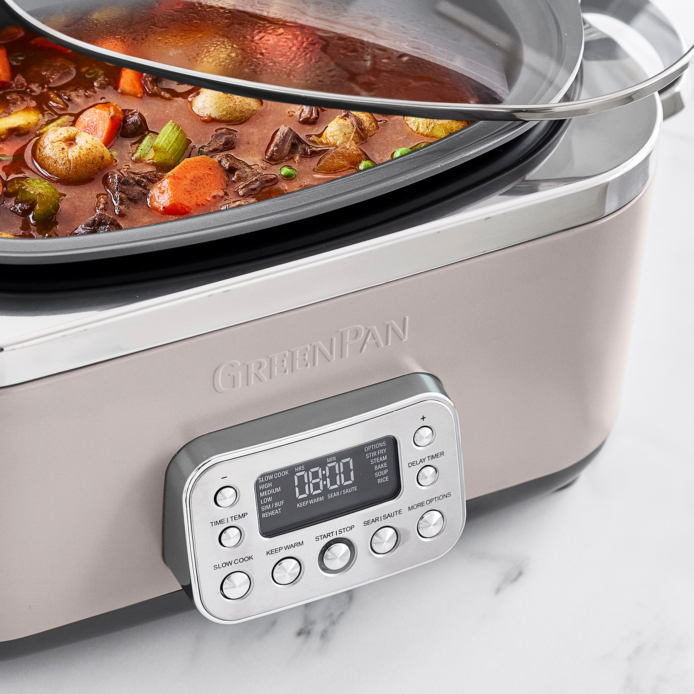Slow cooker with a digital display on a white background