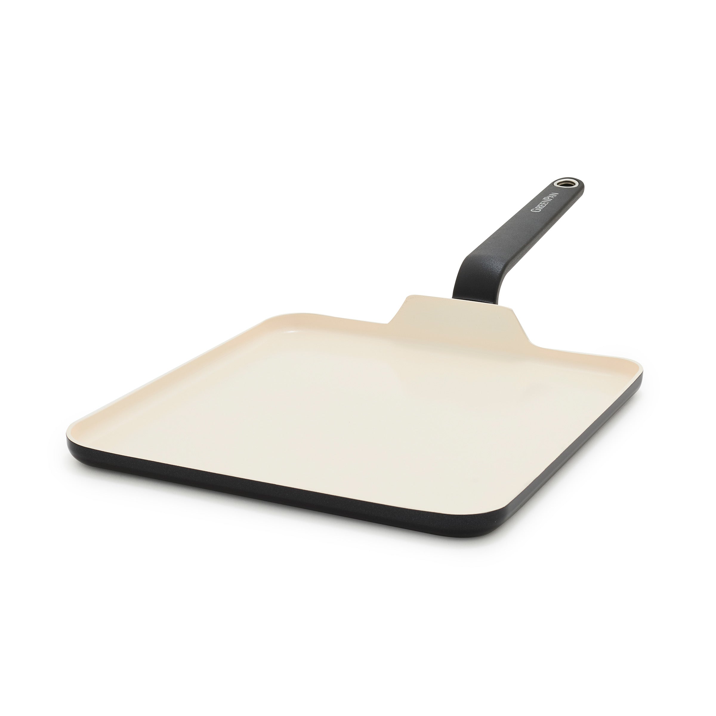 Black square ceramic griddle with a cream interior and an upward angled handle, shown on a white background.