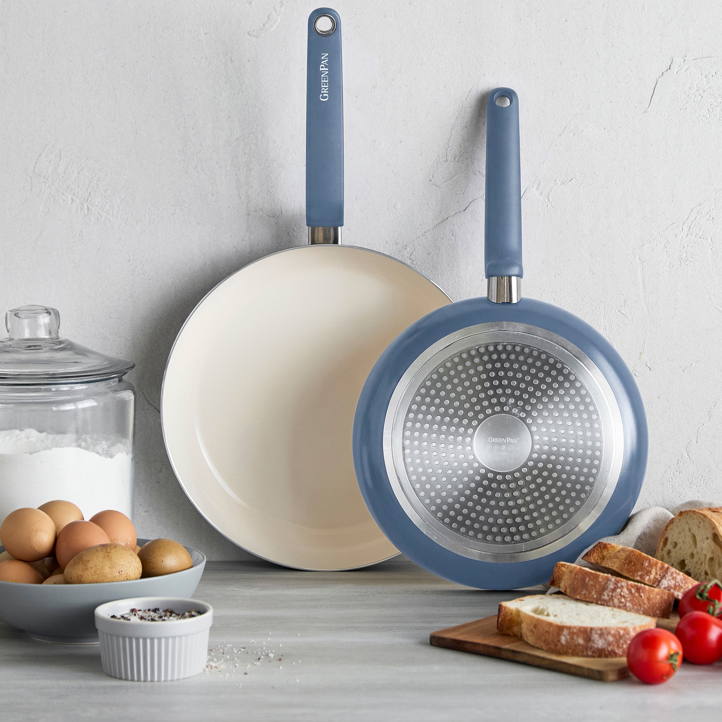 Set of two Dutch blue ceramic nonstick frypans, 10-inch and 12-inch sizes, shown side by side.
