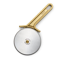Pizza cutter with gold handle and 'Made in Italy' engraving on a white background