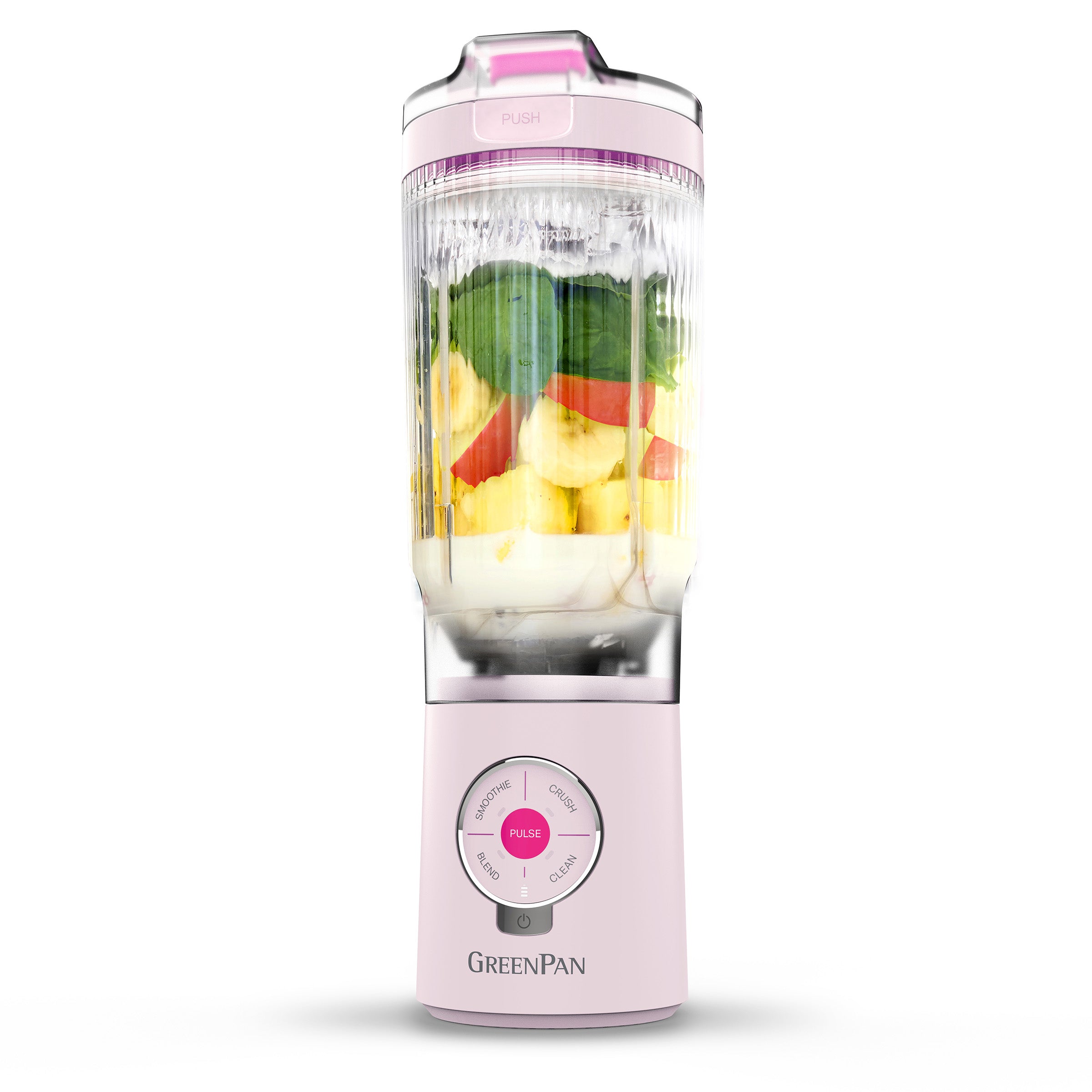 Pink portable blender with fruits inside on a white background
