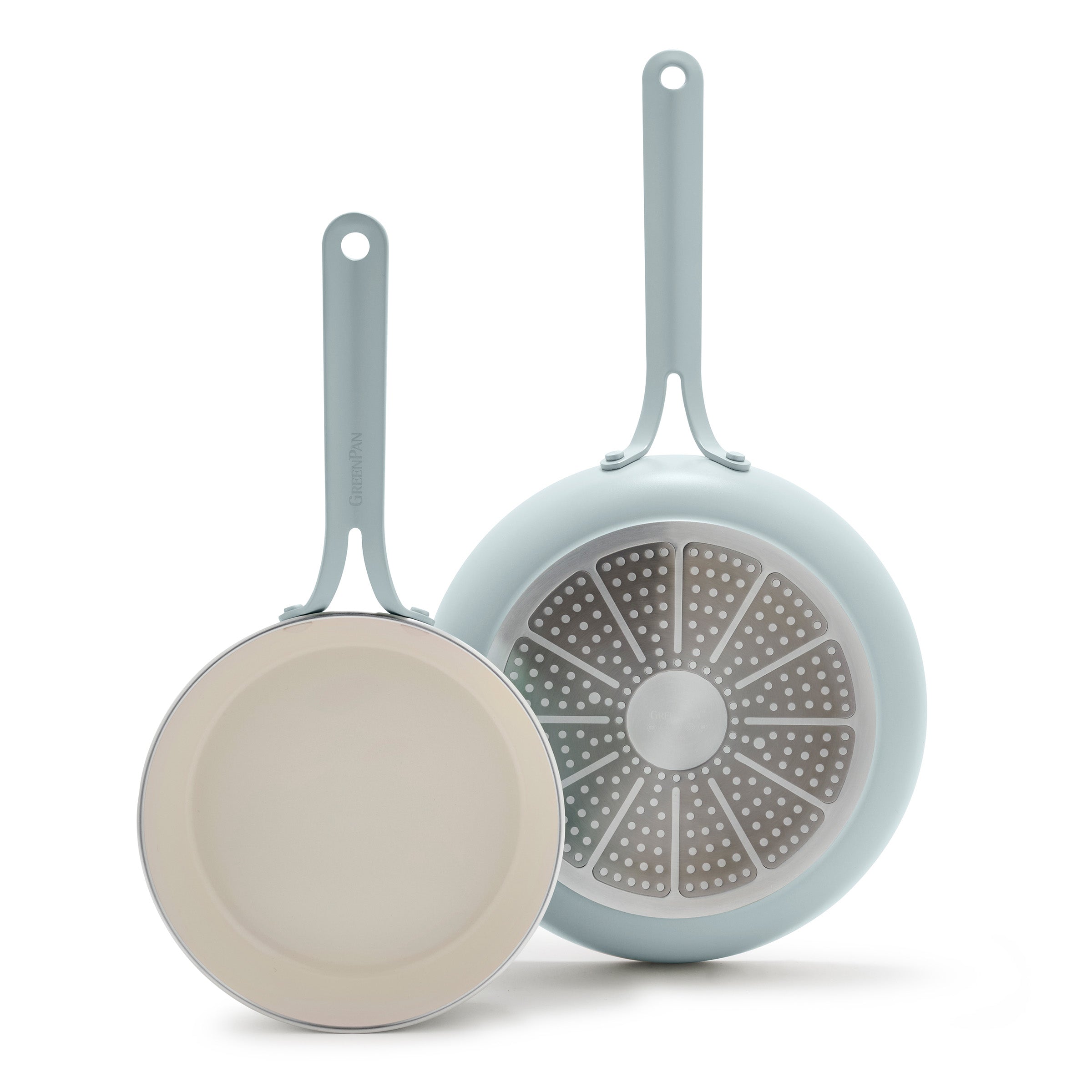 Two frying pans on a white background