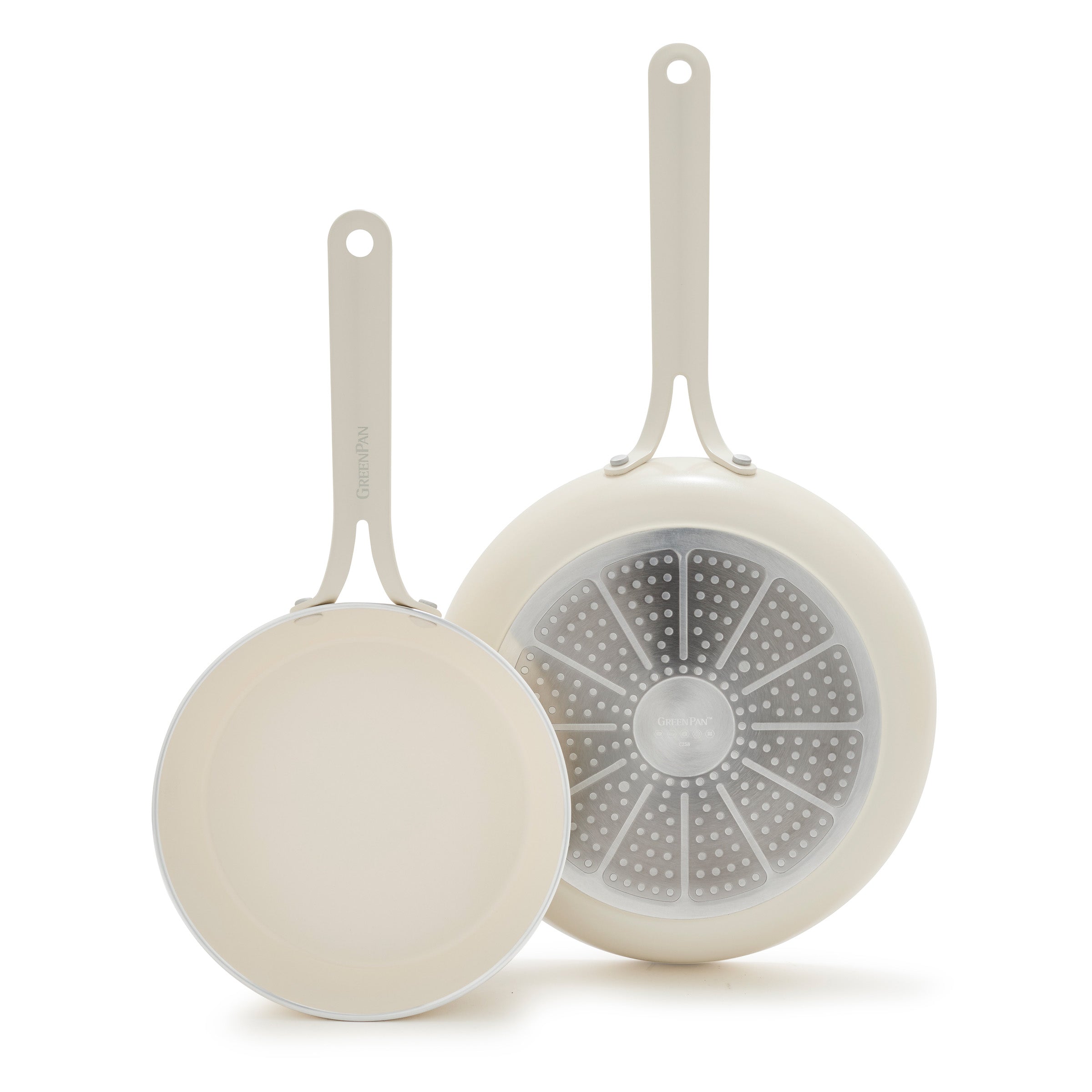 Two white frypans with handles on a white background