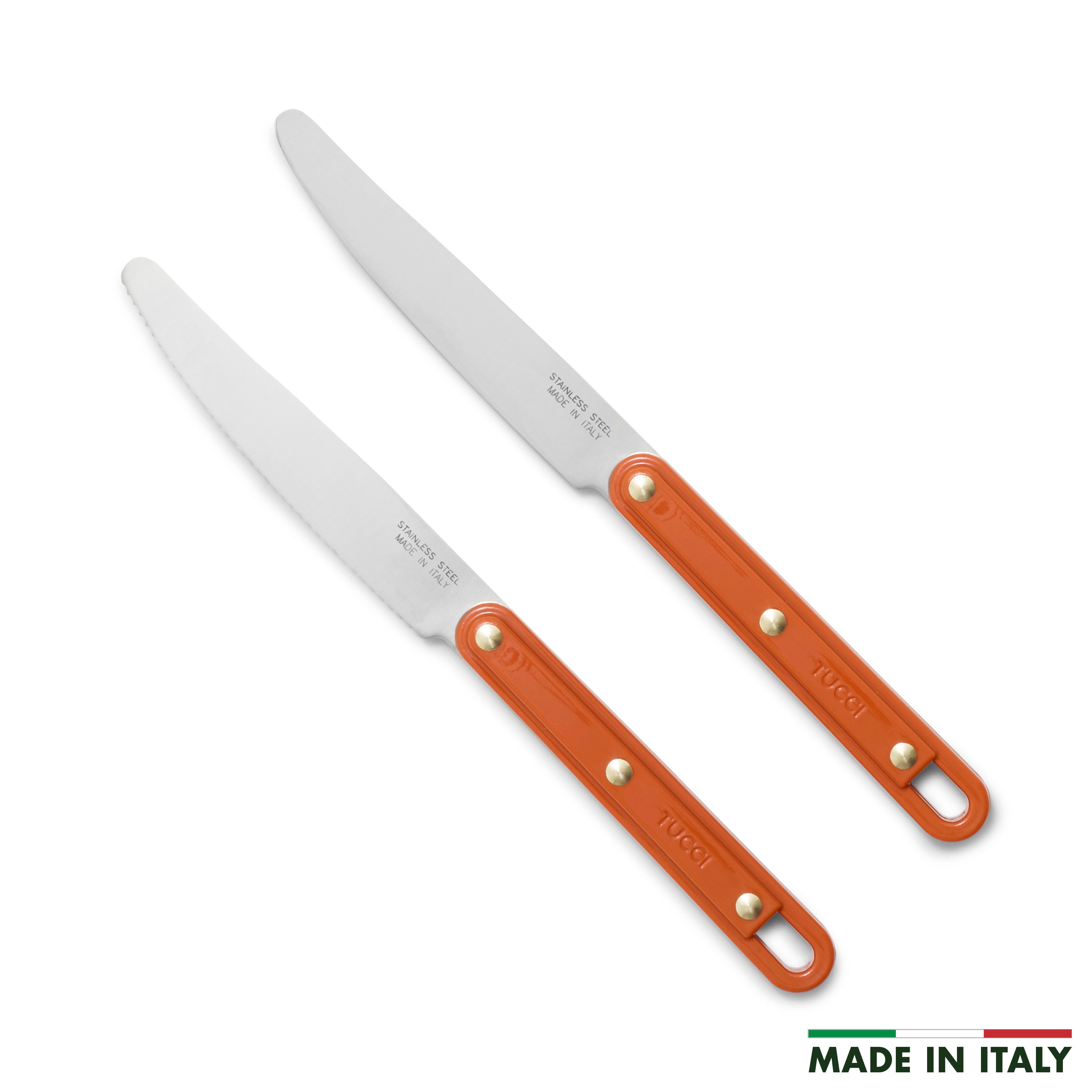 Two kitchen knives with orange handles on a white background, featuring 'Made in Italy' text.