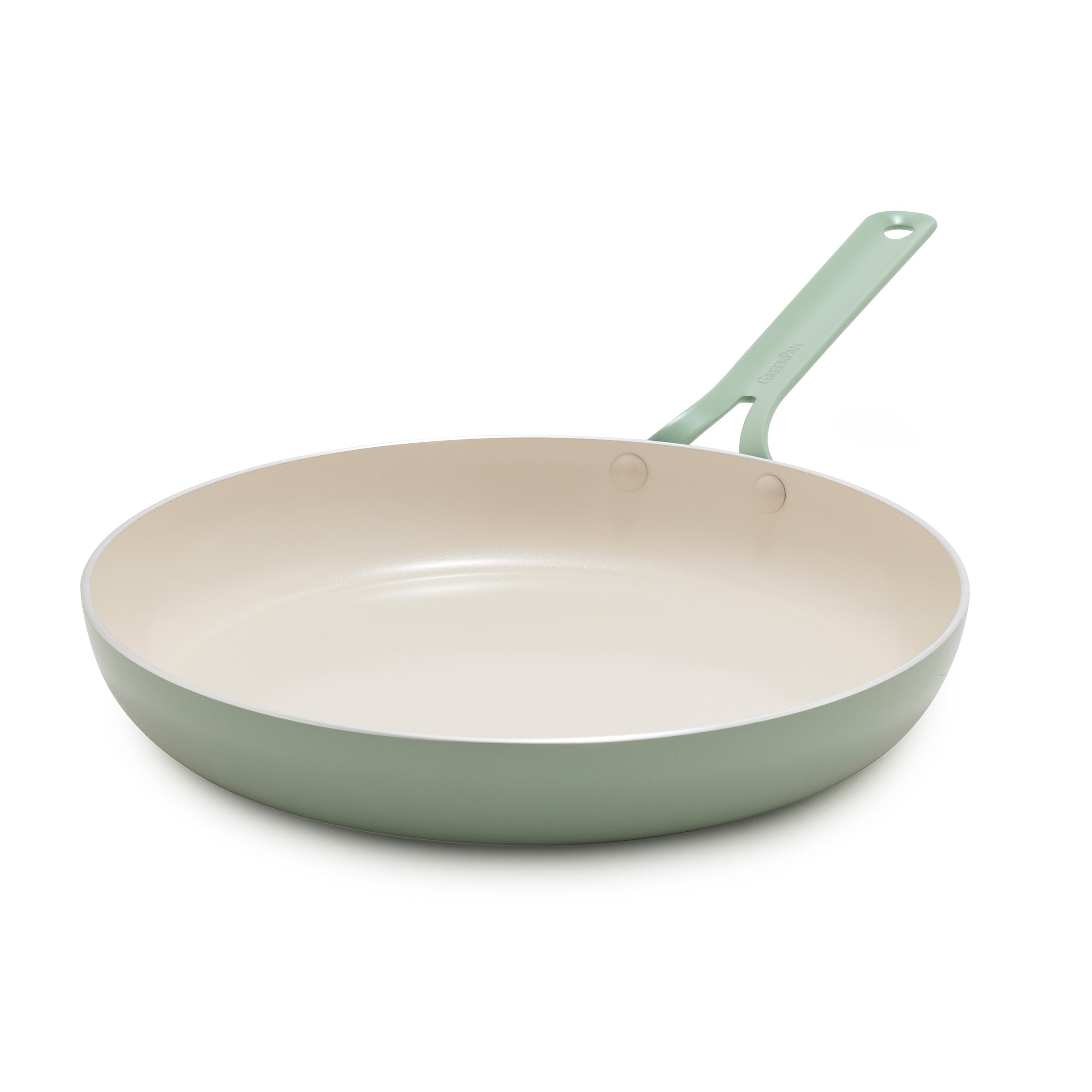 Green frying pan on a white background