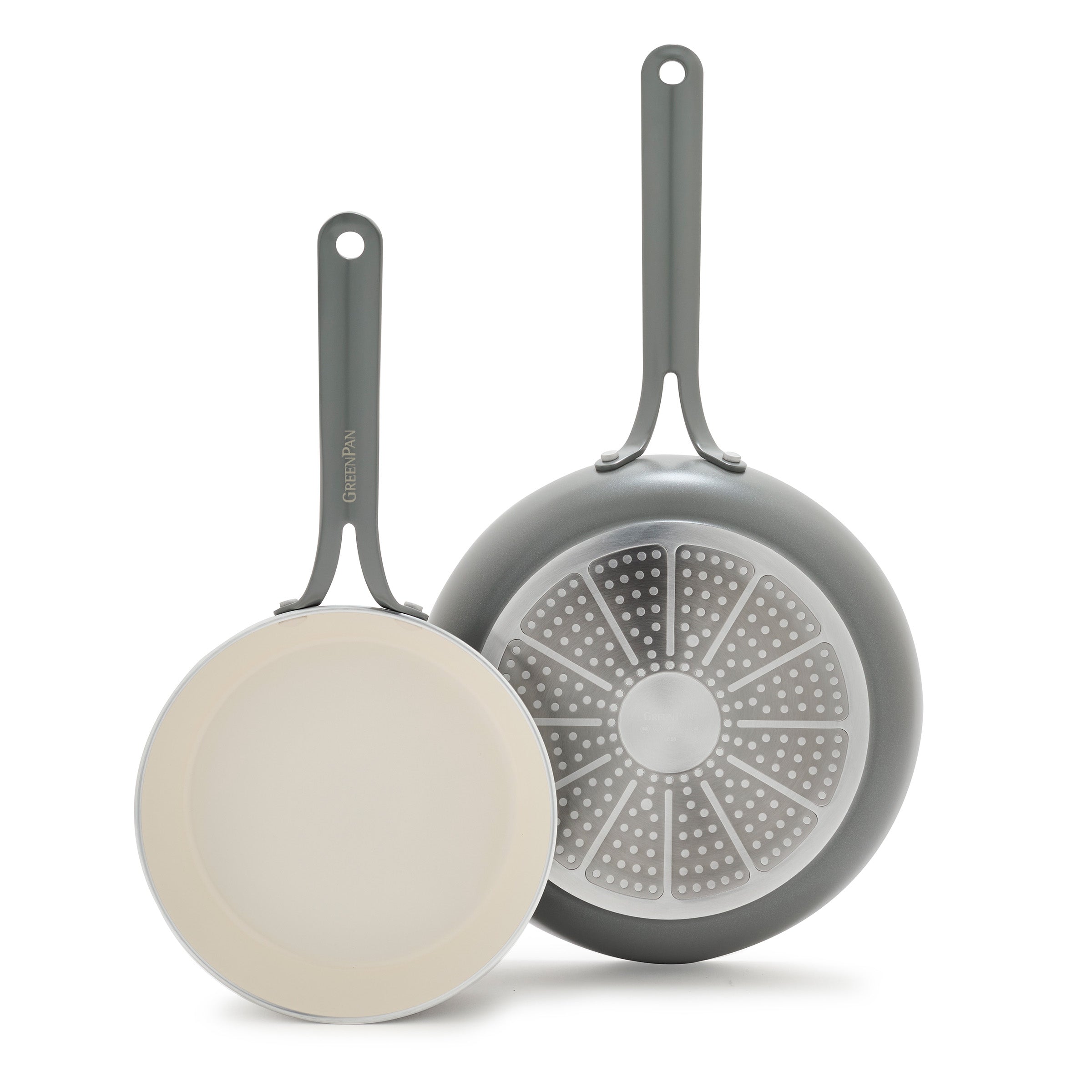 Two frying pans on a white background