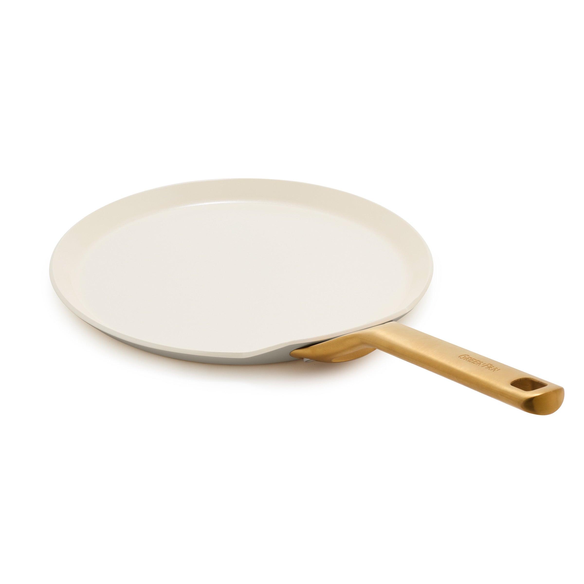 Crepe pan with a gold handle on a white background