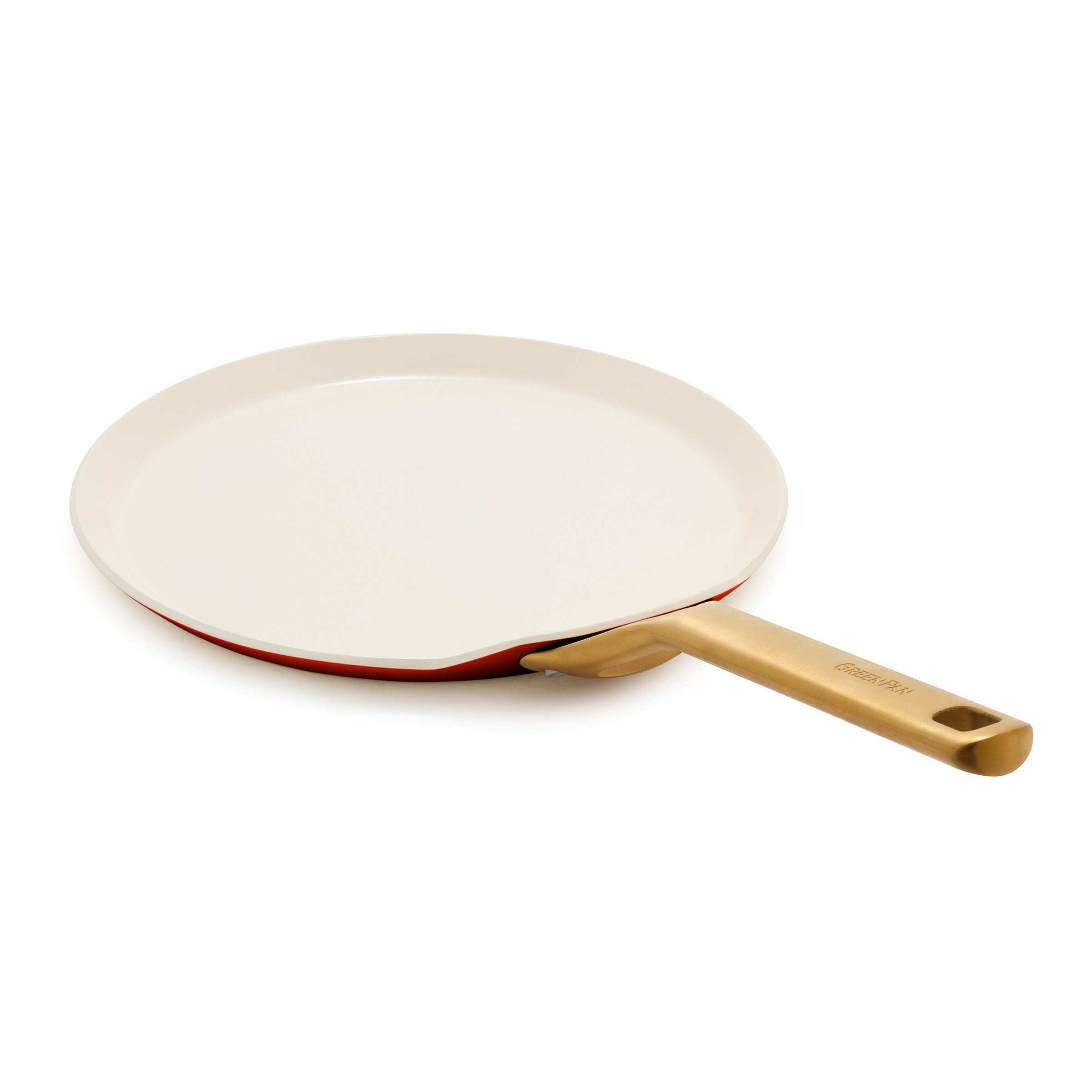 Crepe pan with a gold handle on a white background