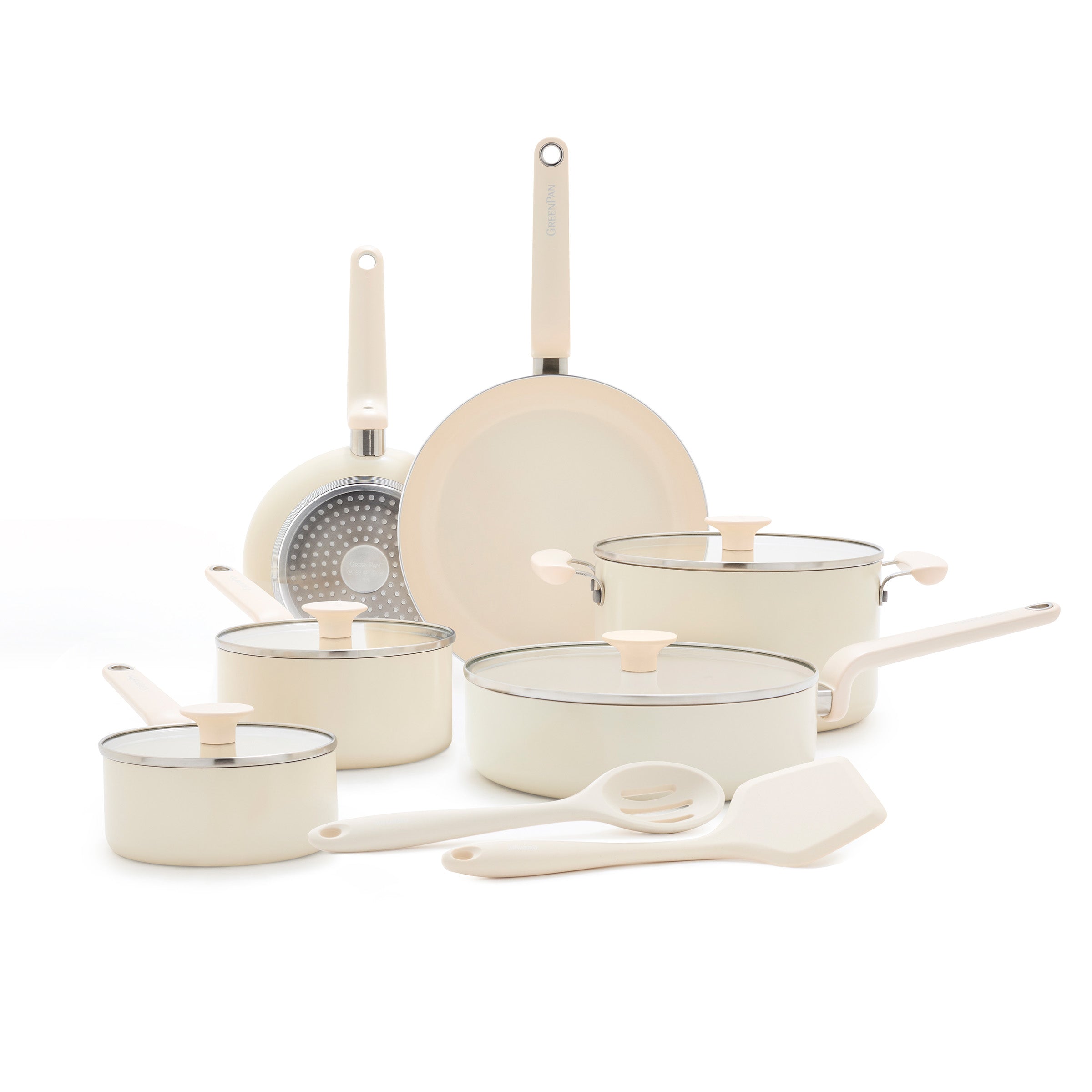Cream ceramic cookware set with pots, pans, lids, and utensils; 12 pieces displayed together.