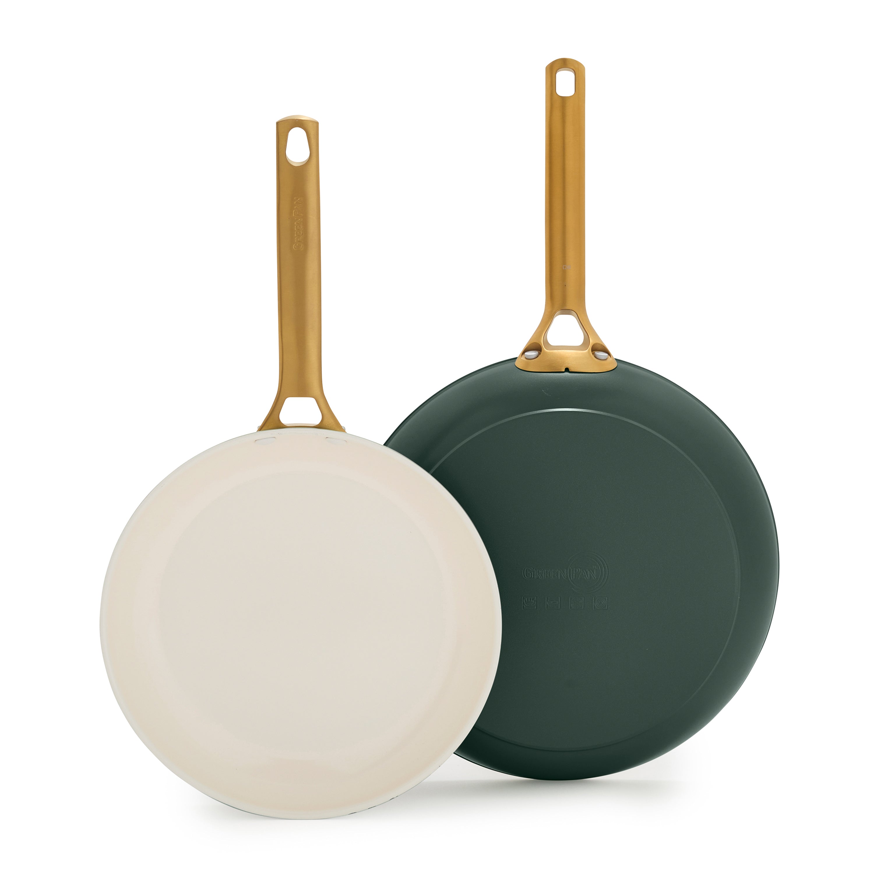 Two ceramic nonstick frypans, 10″ and 12″, in spruce green with gold handles, standing side by side on a white background.