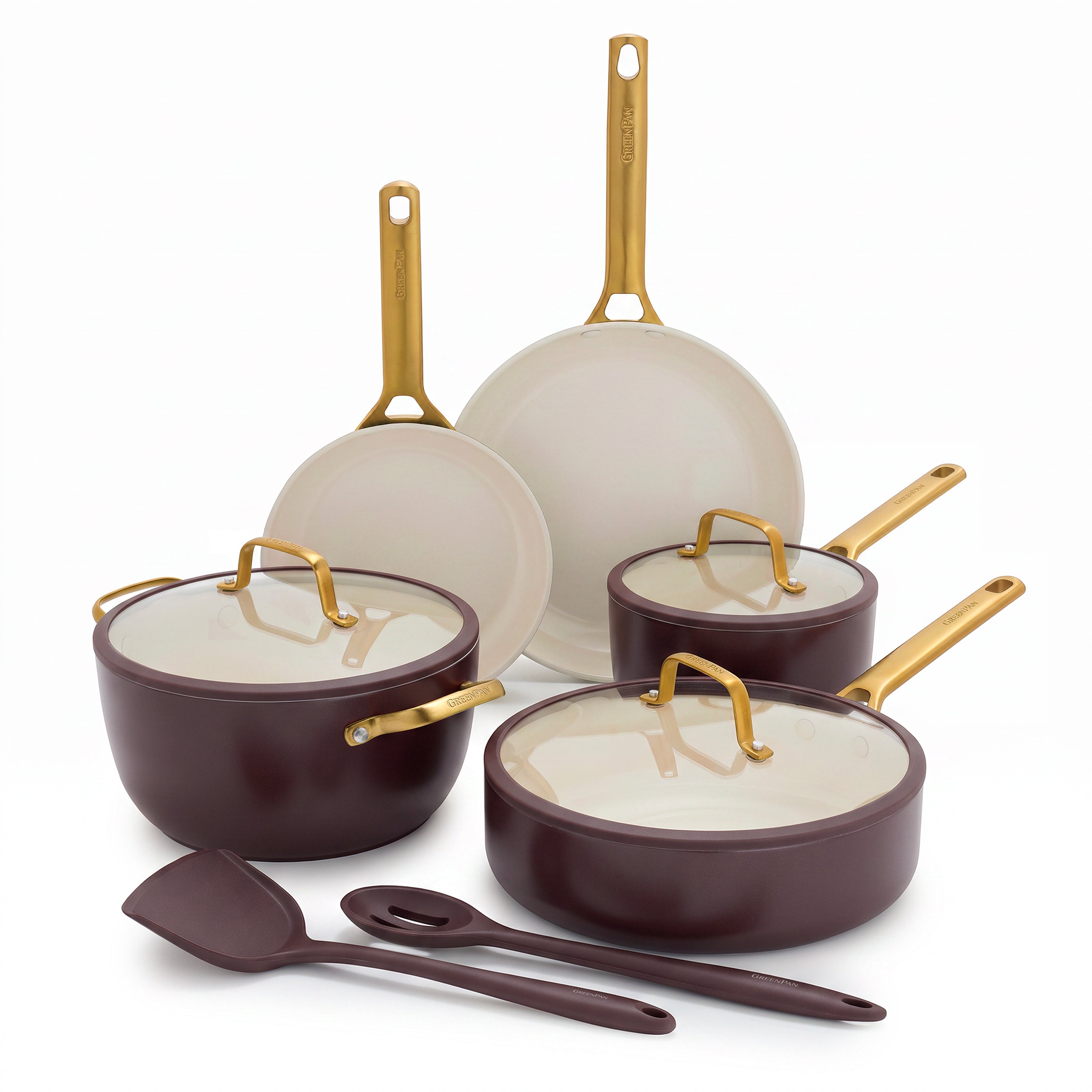 Bordeaux ceramic cookware set with pots, pans, glass lids, spatula, and spoon displayed on a white background.