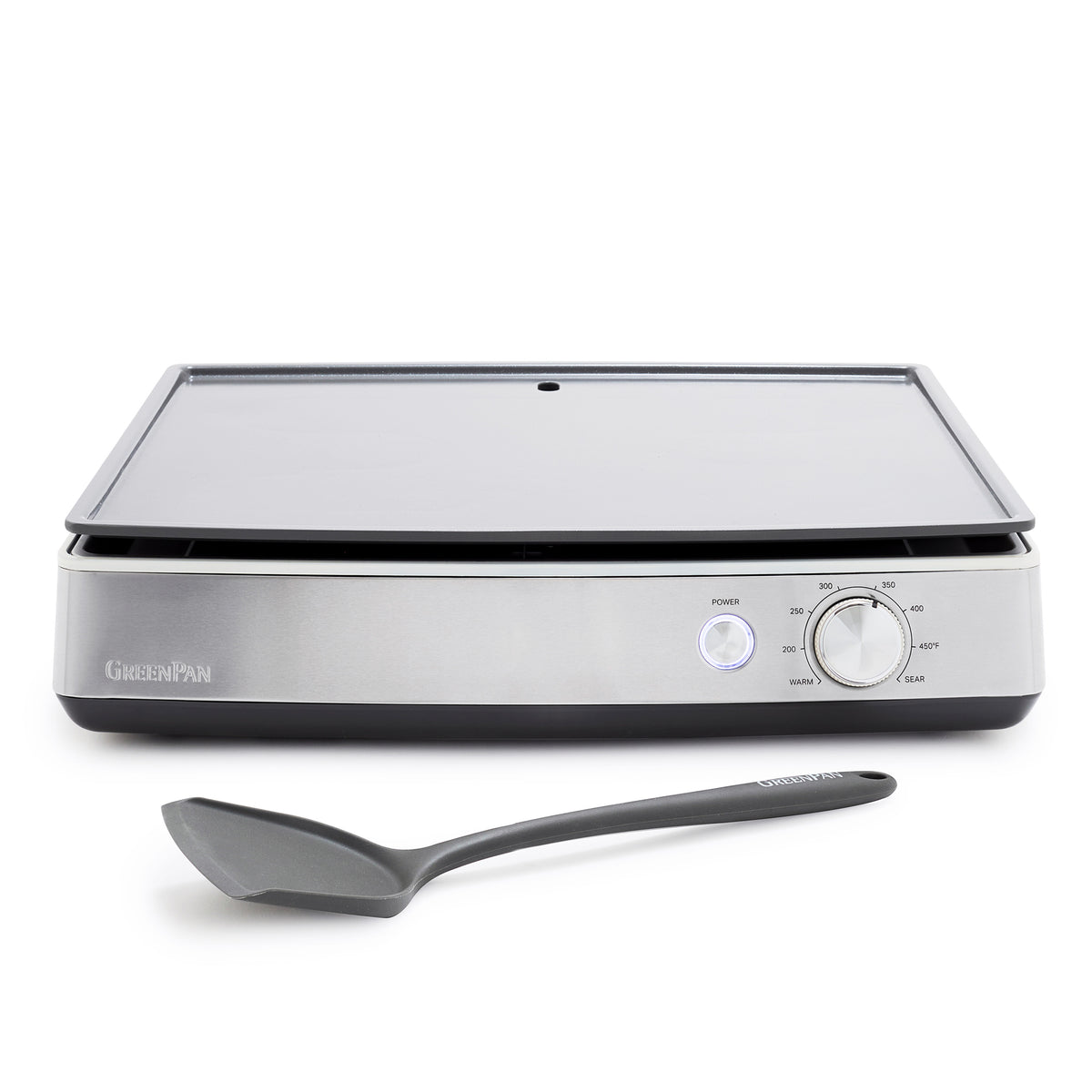 Cream electric countertop griddle with temperature dial, nonstick surface, and grey spatula.
