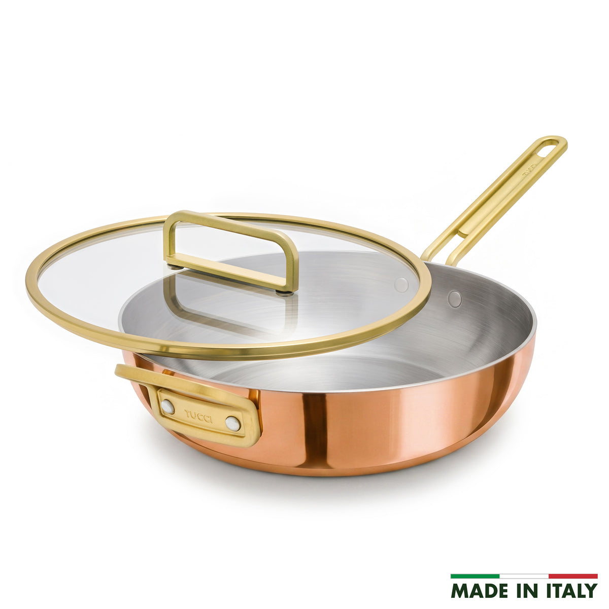 Copper 4.5-quart pan with gold handles and a glass lid, shown partially in the corner.