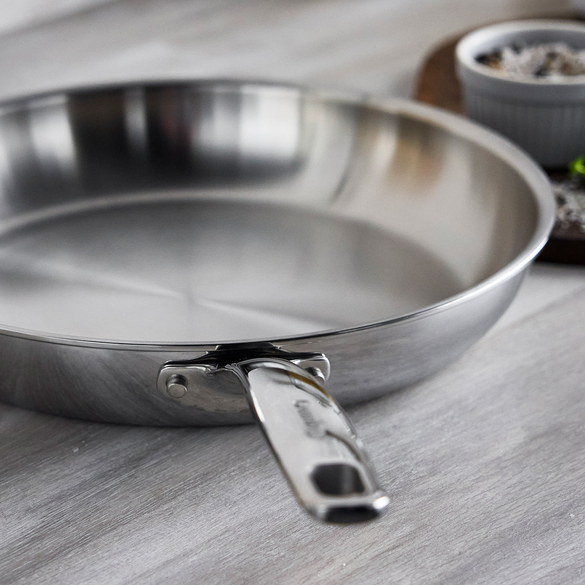 12-inch Chatham Pro stainless steel frypan with a riveted handle and aluminum core.