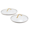 Two glass lids with yellow handles, 10-inch and 12-inch sizes, displayed side by side on a white background.