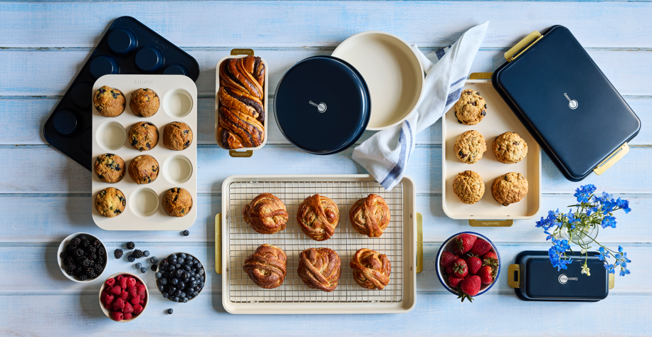 Assorted baked goods and kitchen items on a wooden surface